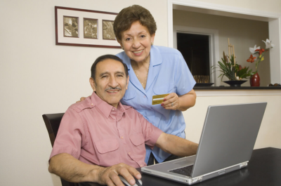 Couple Holding Credit Card
