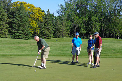 Golf Foursome At Tournament