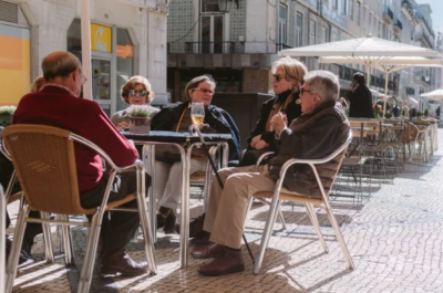 Older Adults Enjoying Outdoor Restaurant